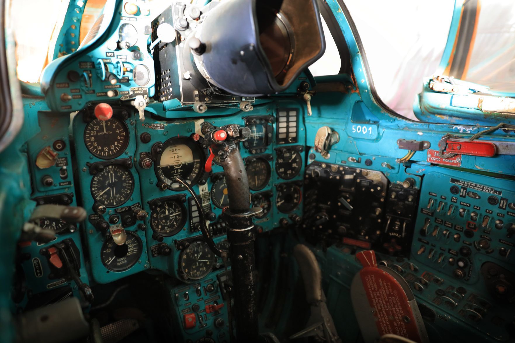 Old military planes at autobody shop in St. Louis